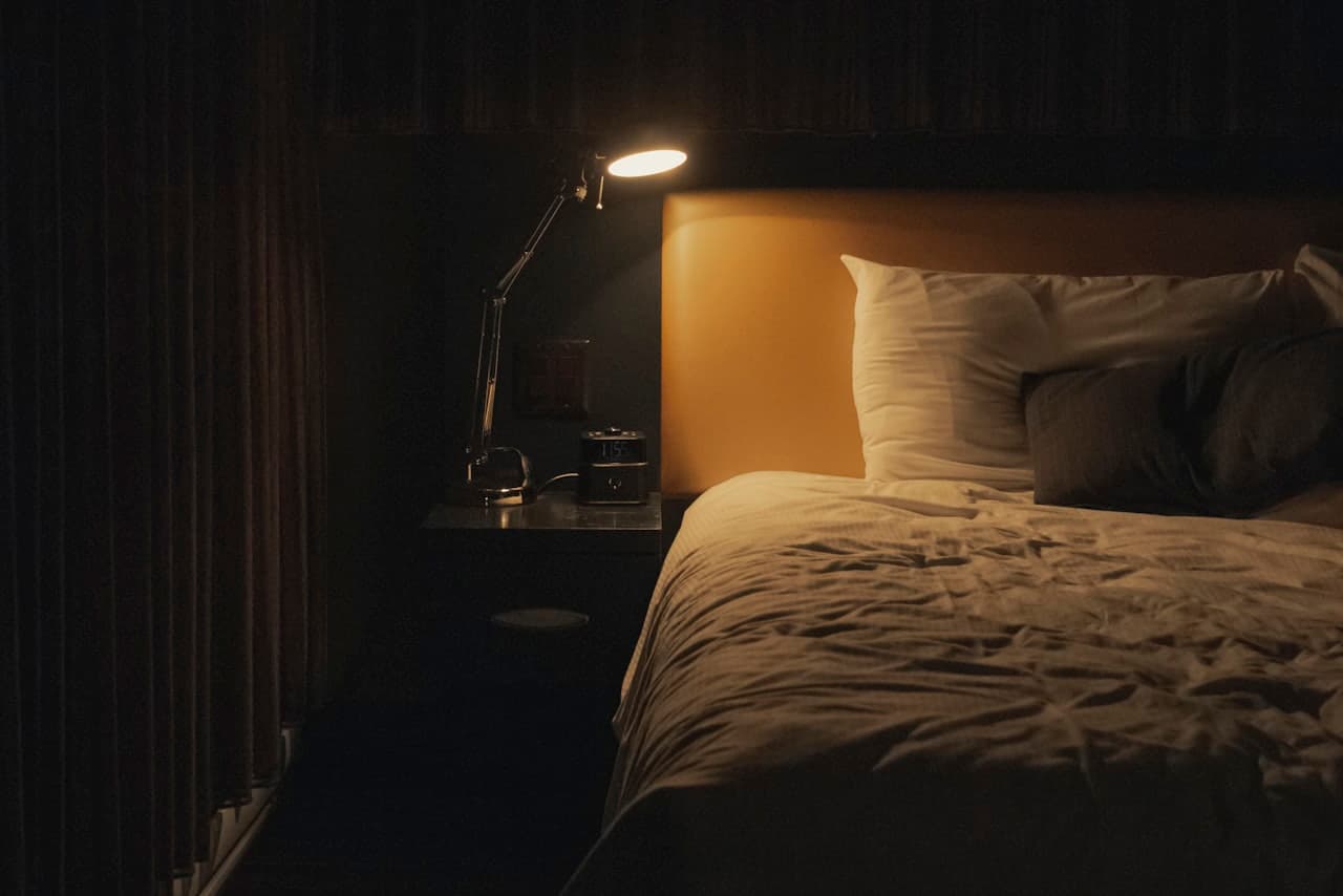 A calm, dimly lit bedroom at night
